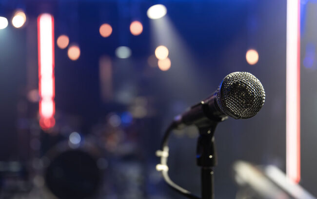 close-up-microphone-concert-stage-with-beautiful-lighting Open Mic advice image